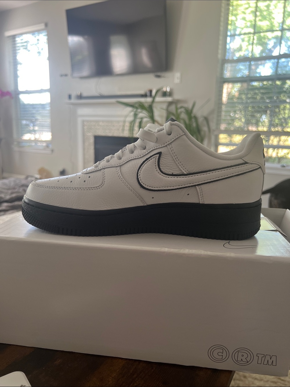Nike White Low-Top Sneakers with Black Sole